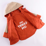 Children wear jackets on both sides