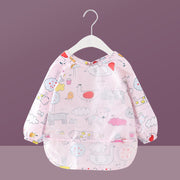 Children In Waterproof Overalls Wear Bibs For Eating